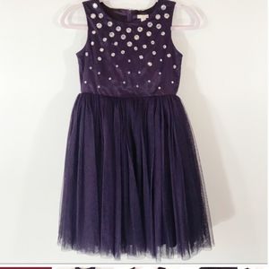 A purple tulle rhinestone dress